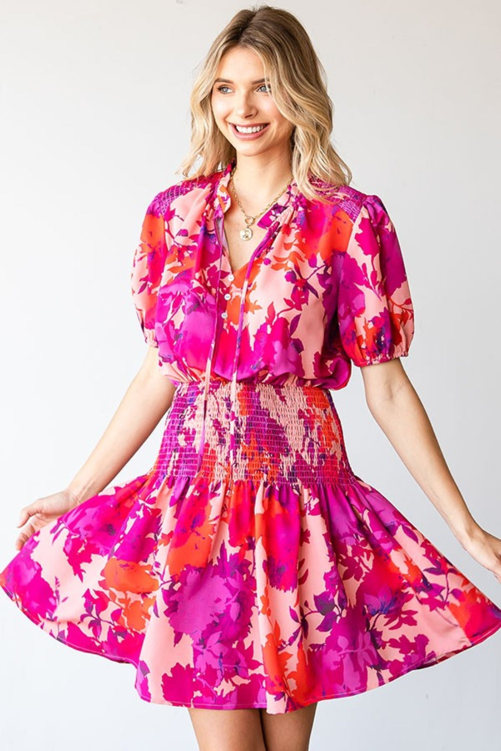 The First Love Floral Short Sleeve Smocked Mini Dress