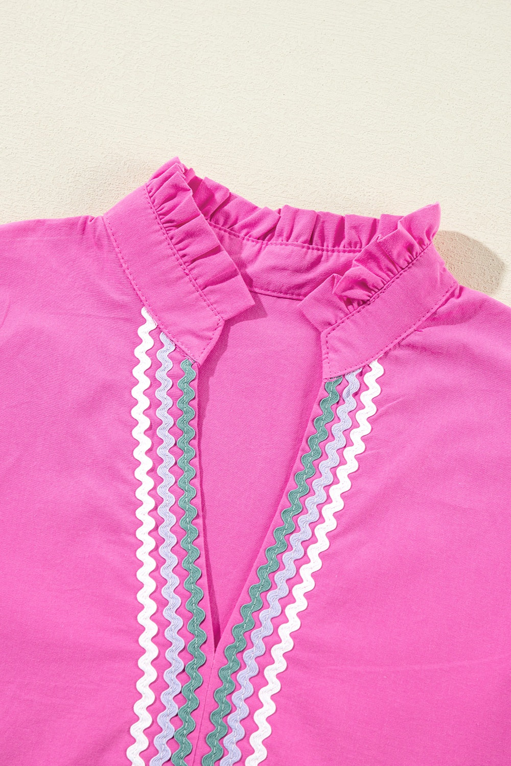 The Ruffled Notched Cap Sleeve Mini Dress