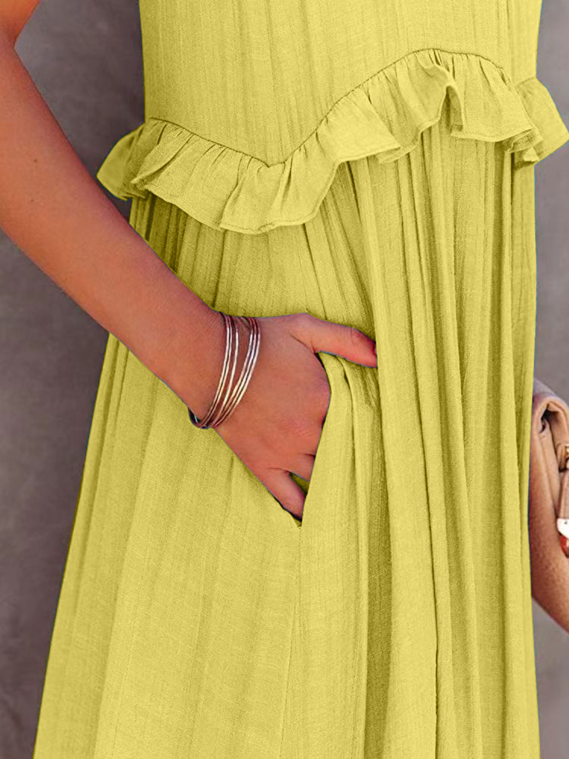 The Ruffled Sleeveless Tiered Maxi Dress with Pockets
