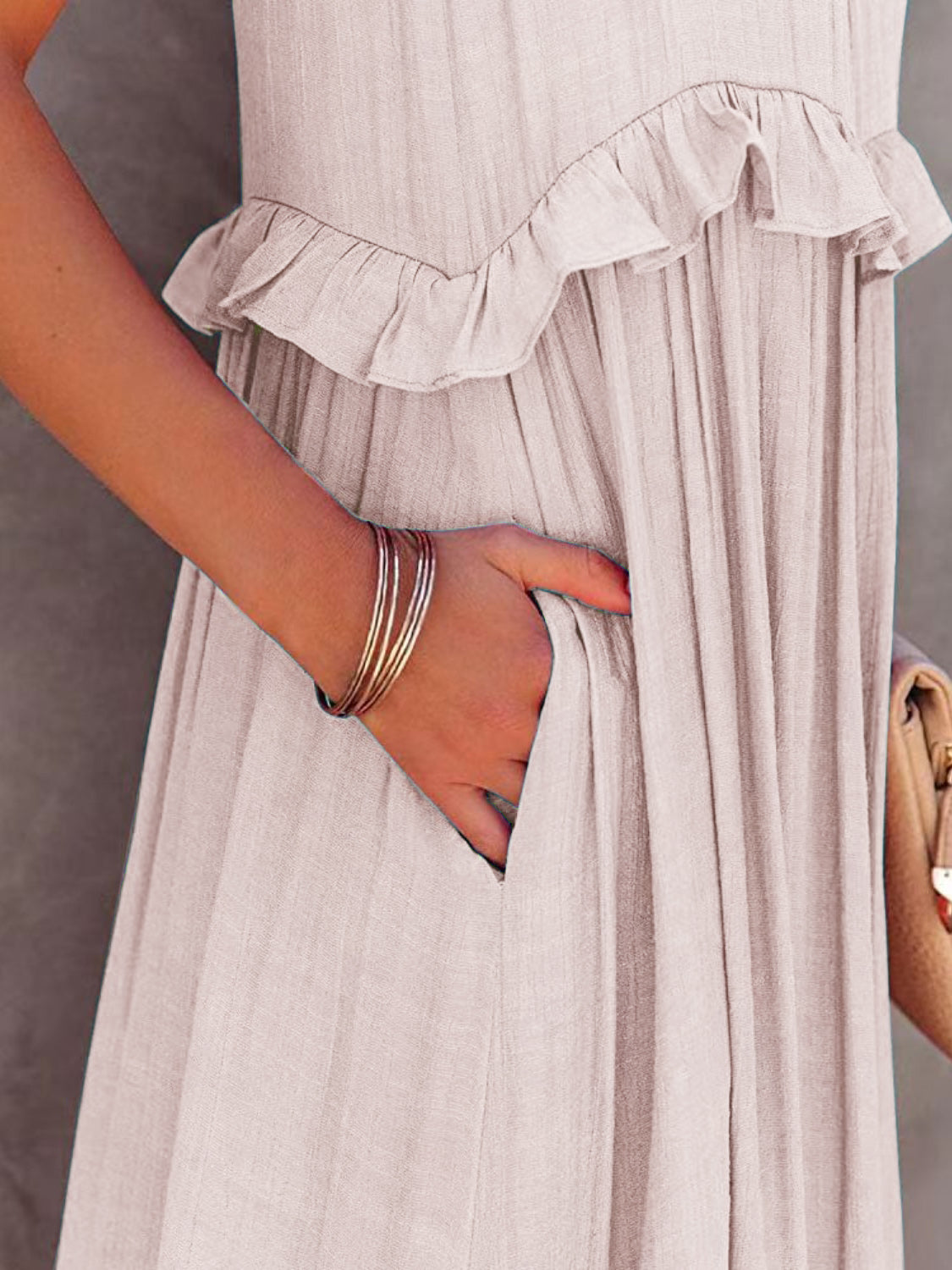 The Ruffled Sleeveless Tiered Maxi Dress with Pockets