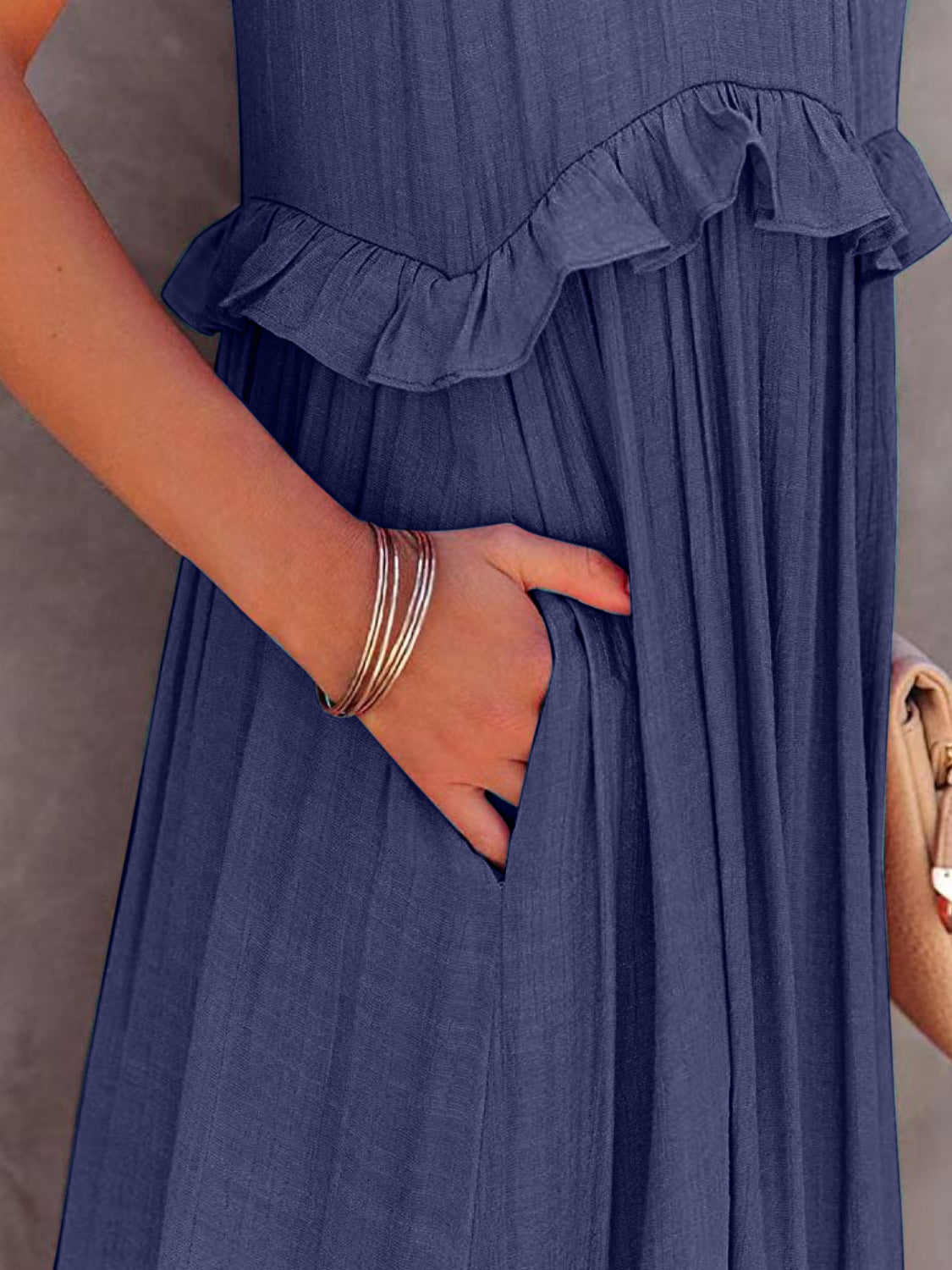 The Ruffled Sleeveless Tiered Maxi Dress with Pockets
