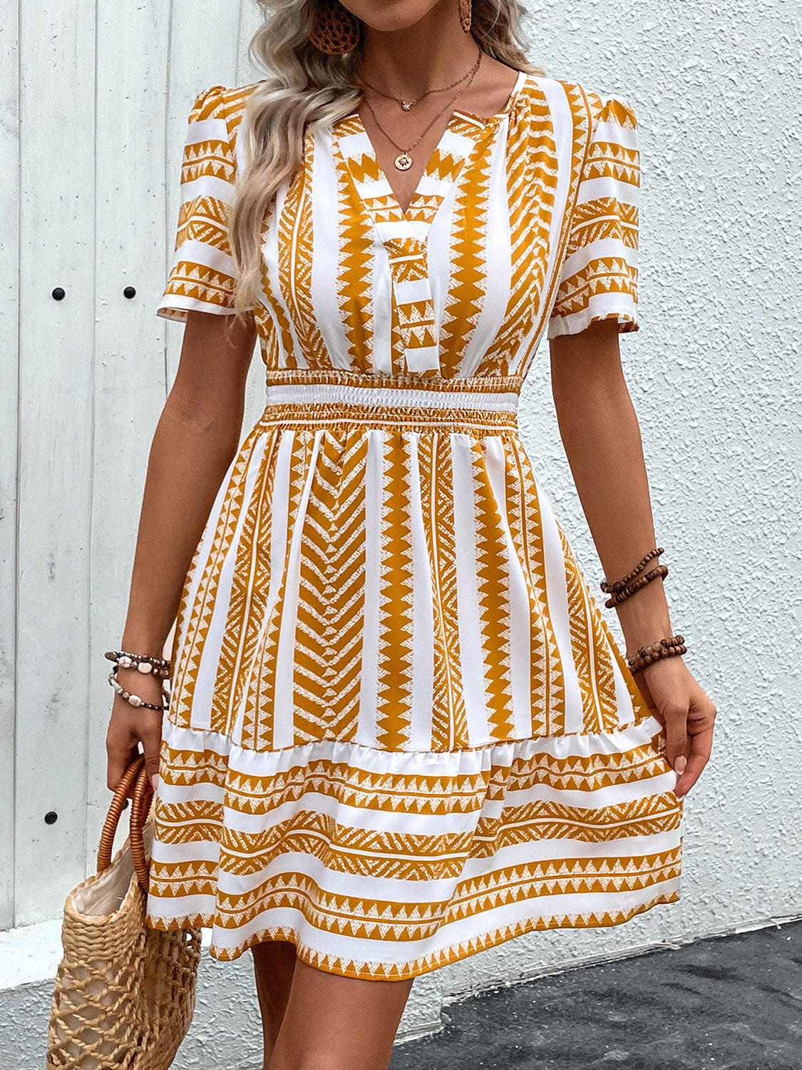 The Geometric Notched Short Sleeve Mini Dress